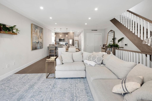 97 Battery Ave Unit 3B, Brooklyn, NY 11209 - living room with recessed lighting, baseboards, and stairway