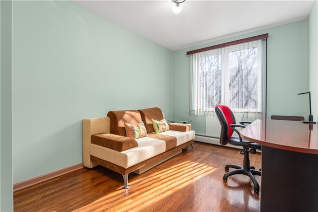 office featuring baseboards and wood finished floors