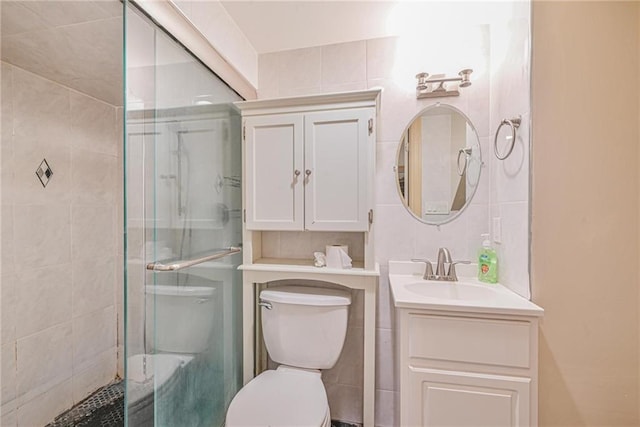 full bath with a shower stall, toilet, and vanity