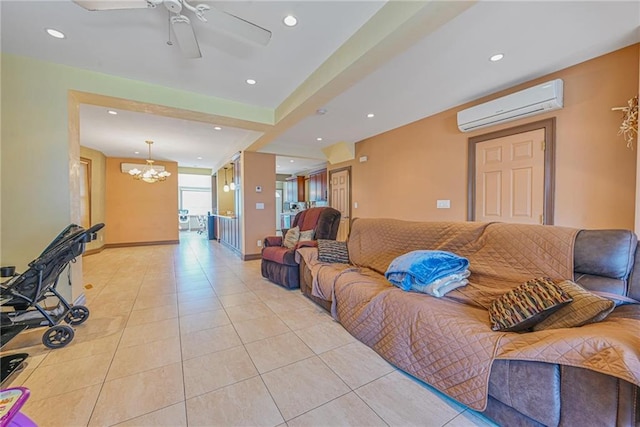 living room with a wall unit AC, light tile patterned floors, a chandelier, recessed lighting, and ceiling fan