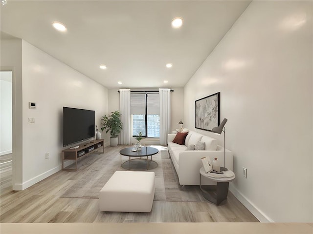 1238 63rd St Unit D301, Brooklyn, NY 11219 - living room featuring wood finished floors, baseboards, and recessed lighting