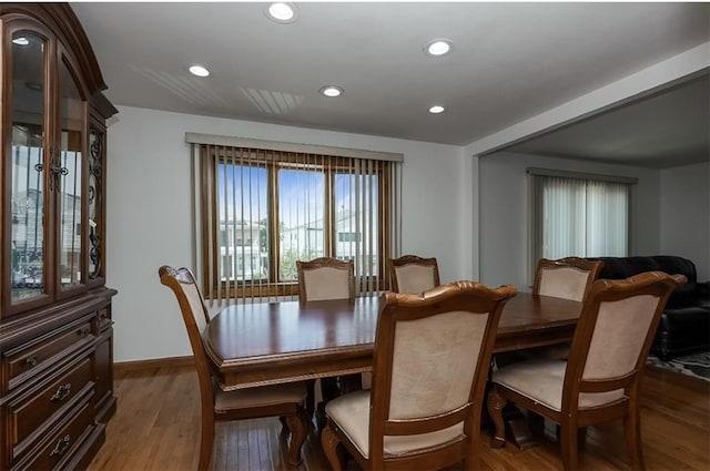 dining room featuring recessed lighting and wood finished floors