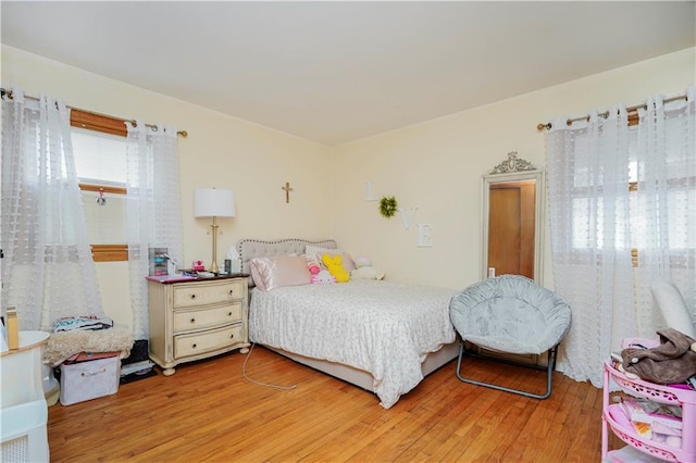 bedroom featuring light wood-style flooring