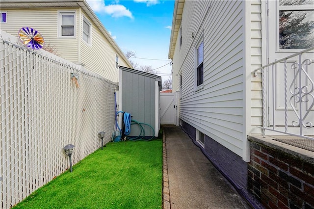 view of home's exterior featuring a yard and a fenced backyard