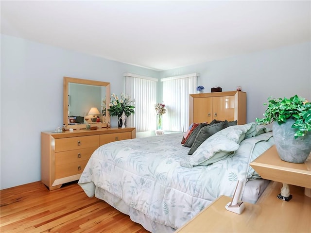 bedroom with light wood-type flooring