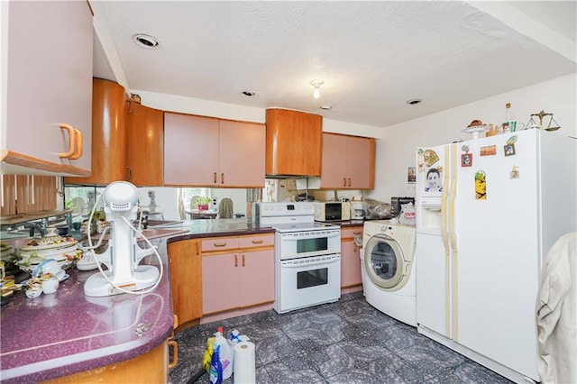 kitchen featuring washer / clothes dryer, brown cabinetry, and white appliances