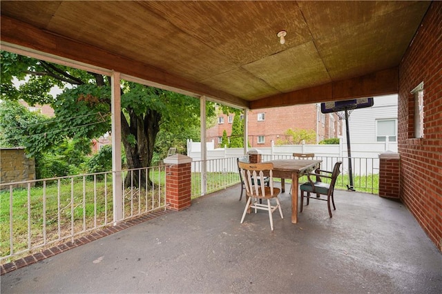 view of patio / terrace with fence and outdoor dining space