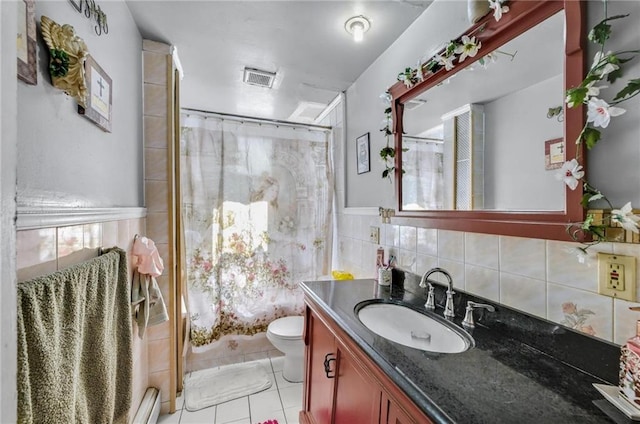 bathroom with visible vents, tile patterned floors, a shower with curtain, and vanity