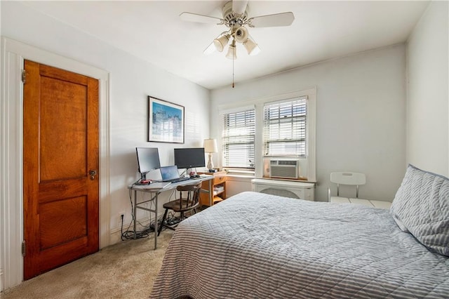 carpeted bedroom featuring a ceiling fan and cooling unit