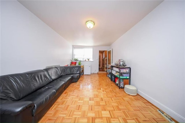 living room featuring baseboards