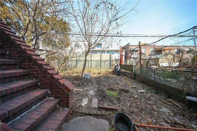 view of yard with fence