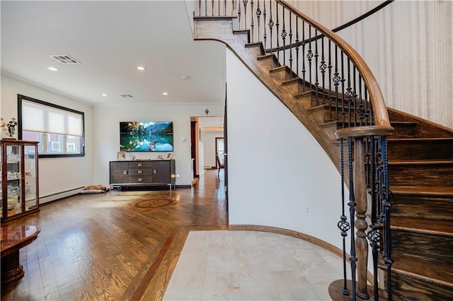 staircase with baseboards, visible vents, baseboard heating, crown molding, and recessed lighting