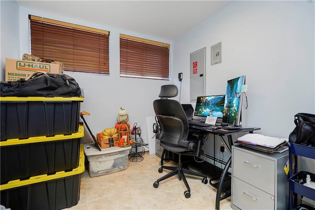 home office featuring tile patterned flooring and electric panel