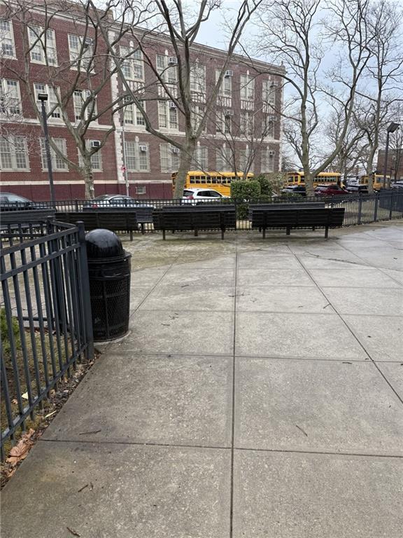 view of property's community with fence