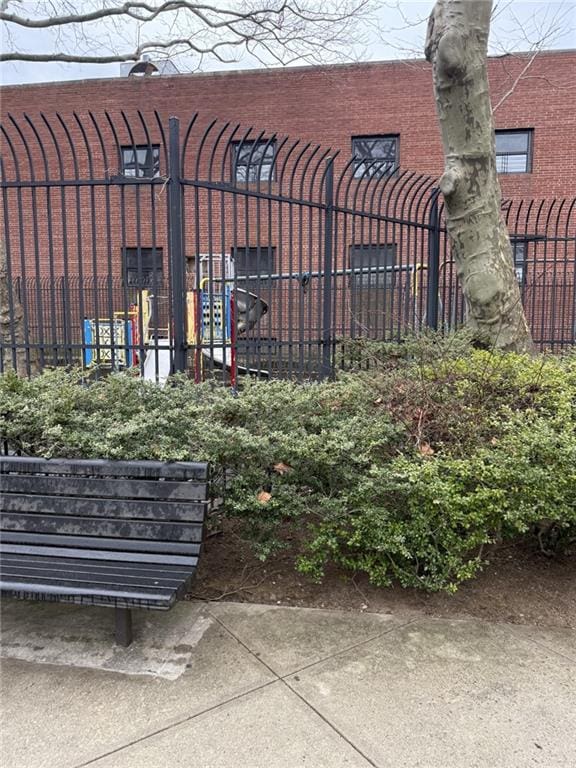 view of gate with fence