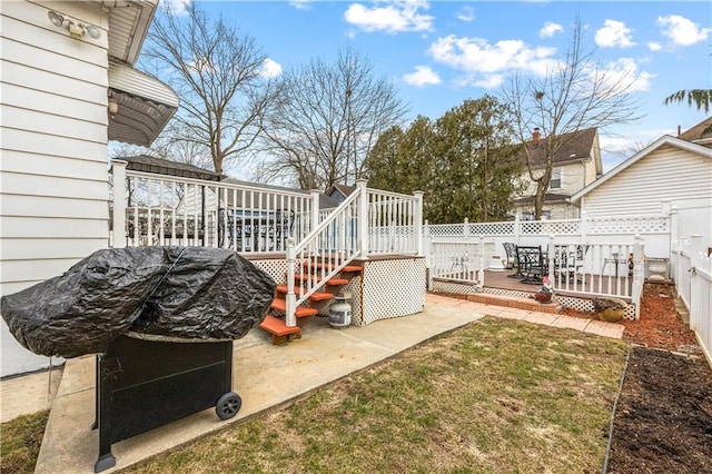 view of yard featuring a fenced backyard and a deck