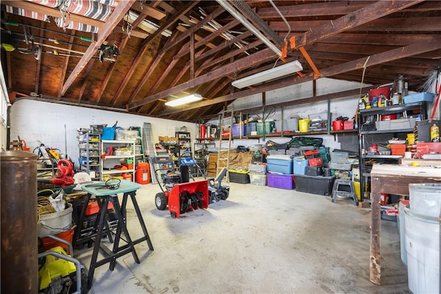 garage with a workshop area