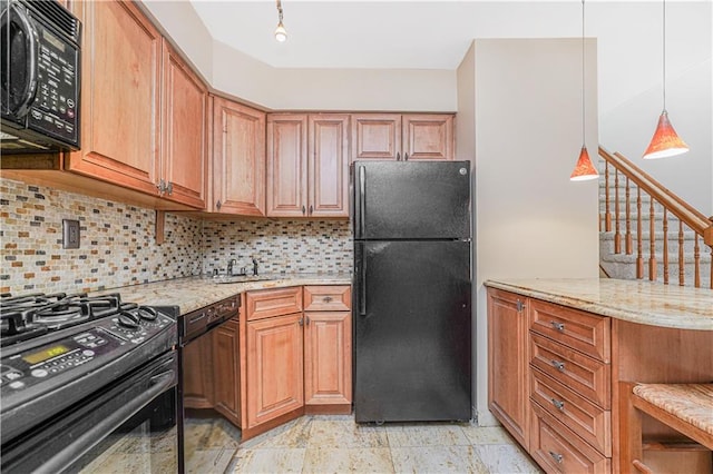 122 Prospect Park SW Unit 10, Brooklyn, NY 11218 - kitchen featuring black appliances, light stone countertops, and decorative backsplash