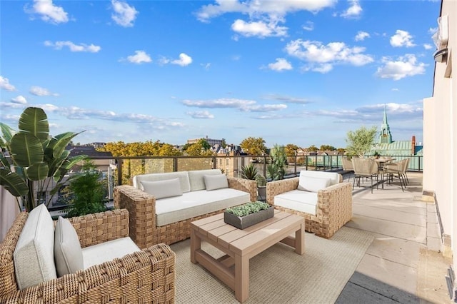 view of patio with outdoor dining area and an outdoor hangout area