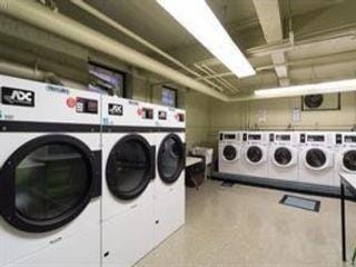 community laundry room featuring washer and dryer