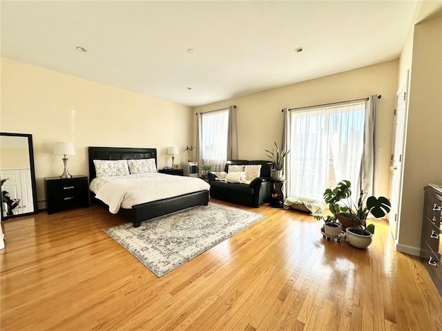 bedroom featuring light wood-style floors