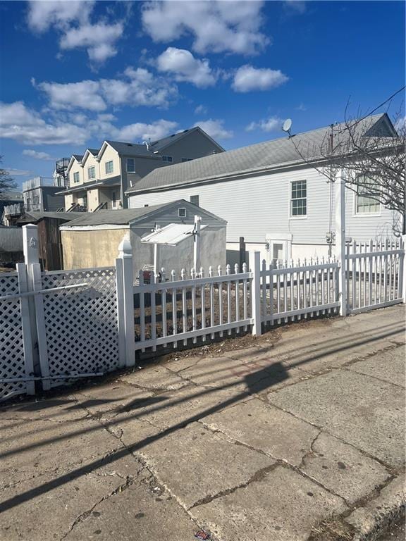 exterior space with a fenced front yard