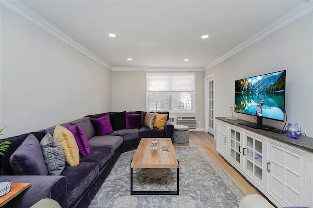 living area with light wood-style floors, recessed lighting, an AC wall unit, and crown molding