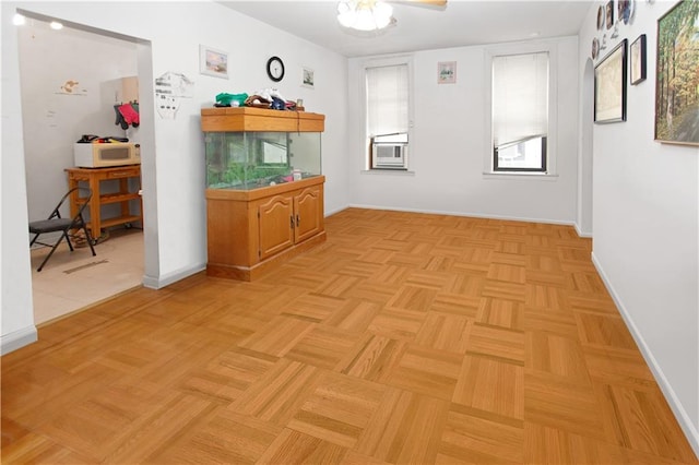 7002 Ridge Blvd Unit F9, Brooklyn, NY 11209 - spare room with baseboards and cooling unit