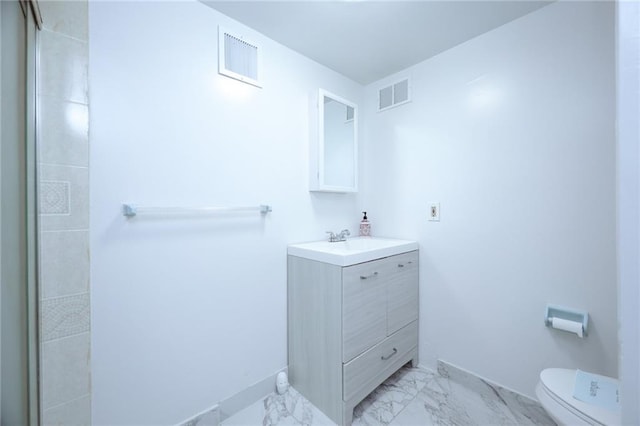 bathroom with marble finish floor, visible vents, vanity, and toilet