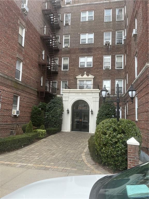 view of property with stairway