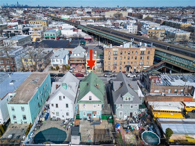 birds eye view of property featuring a view of city