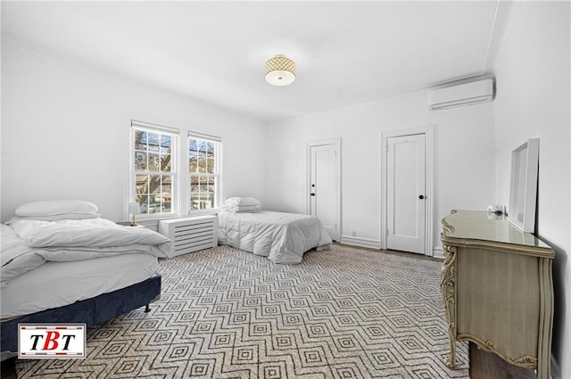 bedroom featuring a wall mounted AC