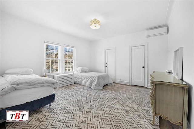 bedroom featuring an AC wall unit