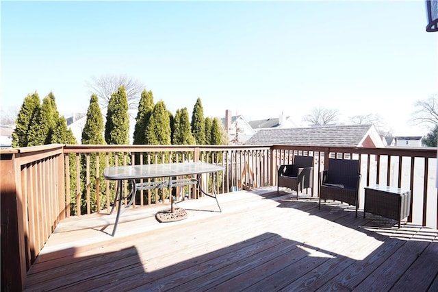 deck with outdoor dining space