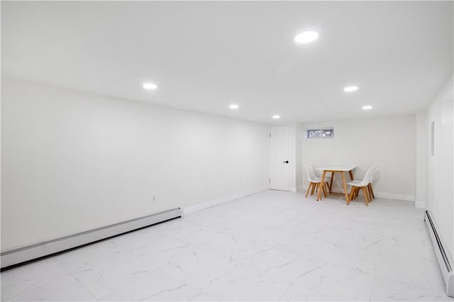 living area featuring recessed lighting, a baseboard heating unit, baseboards, marble finish floor, and baseboard heating