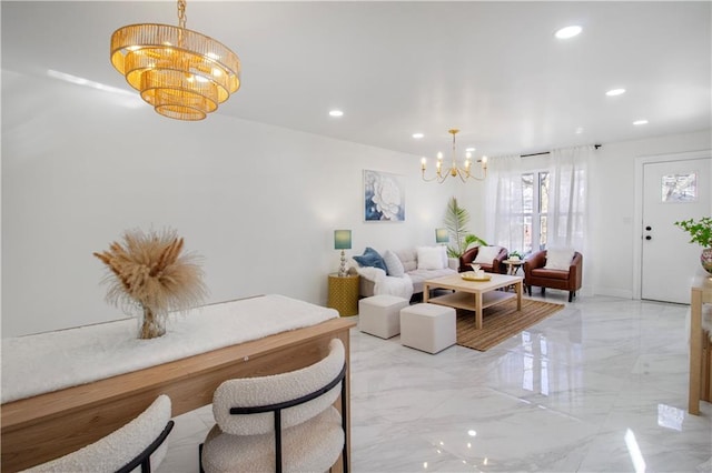 living area with a chandelier, recessed lighting, marble finish floor, and baseboards