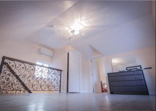 3224 L Ave, Brooklyn, NY 11210 - bonus room featuring lofted ceiling and a wall unit AC