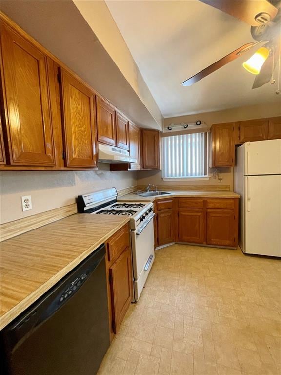 kitchen featuring light countertops, white appliances, brown cabinets, and under cabinet range hood