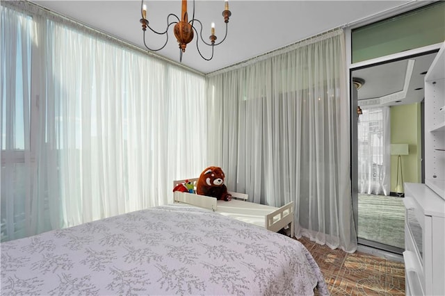 384 Neptune Ave Unit 601, Brooklyn, NY 11235 - bedroom with an inviting chandelier