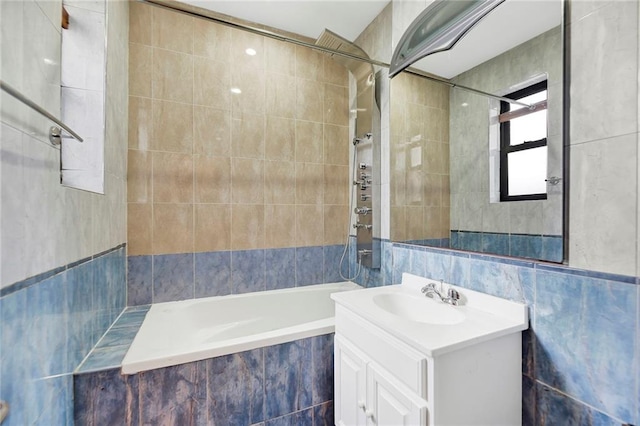 260 Ocean Pkwy Unit 6D, Brooklyn, NY 11218 - bathroom with tile walls, vanity, and tiled shower / bath combo