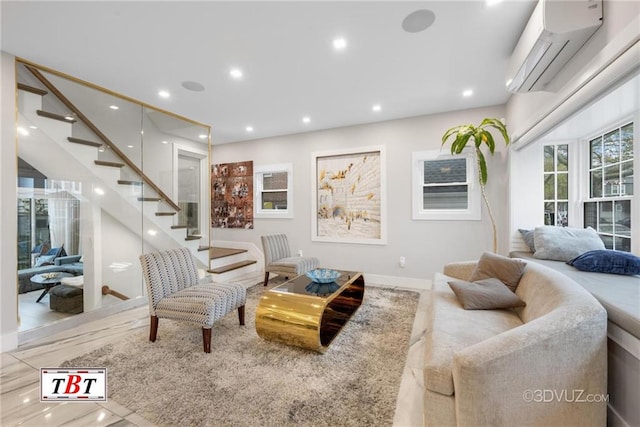 living room featuring recessed lighting, wood finished floors, a wall mounted air conditioner, baseboards, and stairs