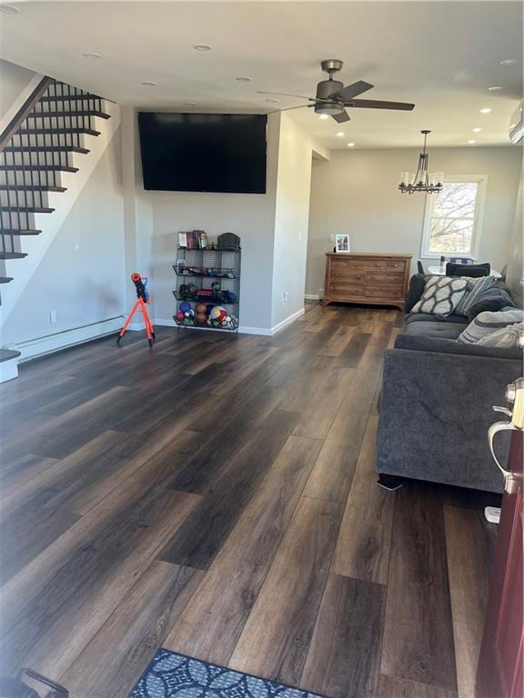 living room featuring baseboards, recessed lighting, a ceiling fan, wood finished floors, and stairway