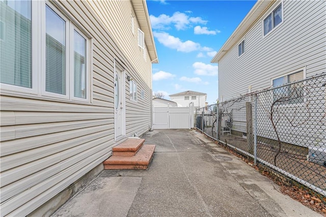 exterior space with a gate and fence