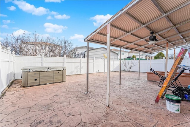 view of patio / terrace with a fenced backyard and ceiling fan