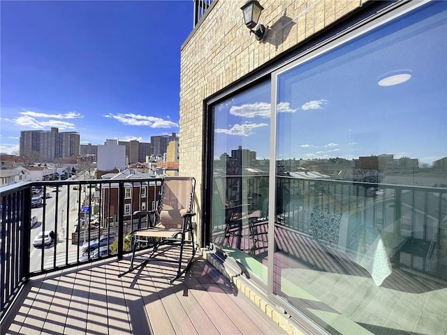 balcony featuring a city view