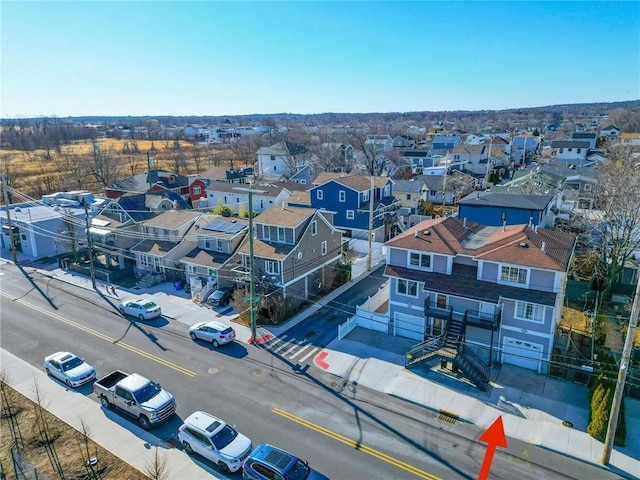 drone / aerial view with a residential view