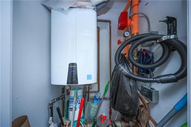 utility room with water heater