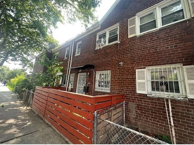 2195 Linden Blvd, Brooklyn, NY 11207 - multi unit property with brick siding and cooling unit
