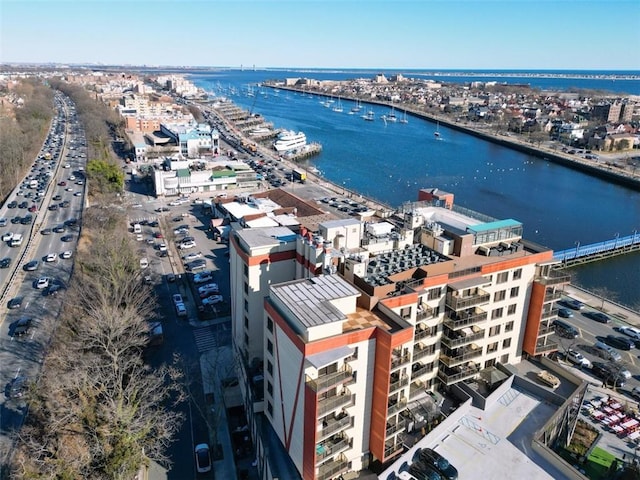 aerial view with a water view and a city view