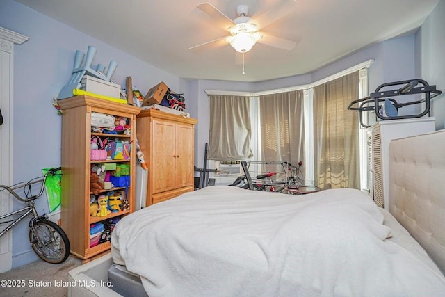 bedroom featuring carpet and a ceiling fan